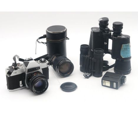 A Chinon CX camera, fitted with a Chinon 1:1.7 f=55mm lens; a cased Auto Chinon 1:2.8 f=135mm lens; two pairs of binoculars e