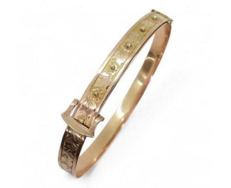 A 9ct rose gold buckle pattern extendable bangle, engraved with leaves, hallmarked Birmingham 1852, makers mark WJS, weight 1