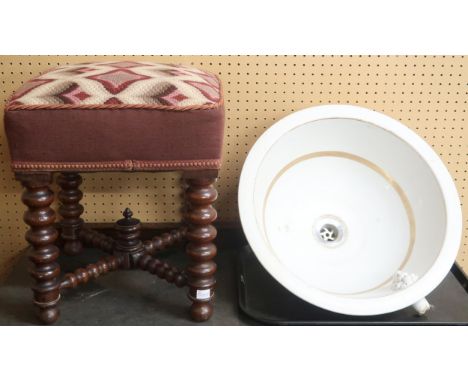 A lot comprising a 19th century white and gilt ceramic circular basin with lion head water spout, 20cm high x 42cm diameter, 