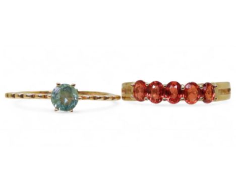 A 9ct gold winza ruby ring, size Q, together with a 9ct gold emerald ring, size P1/2, weight together 3.8gms, both rings with