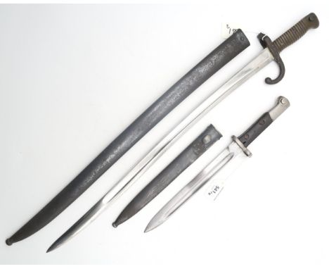 A French Model 1866 Chassepot bayonet, dated 1871 to spine, the blade measuring approx. 57cm in length and housed in a steel 