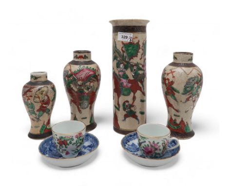 A Chinese Nanking 'Warriors' garniture set, two Famille rose cups, and a pair of blue and white export saucers (8) Condition 