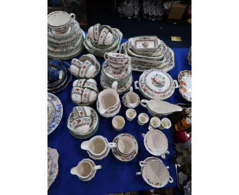 A Spode Chinese Rose dinner service comprising breakfast cups, soup coupes, tea cups and saucers,&nbsp; assorted jugs, tureen