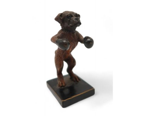 A 20th century after Bergman cold painted bronze figurine of a Boxer dog wearing boxing gloves, stamped to back with letter '