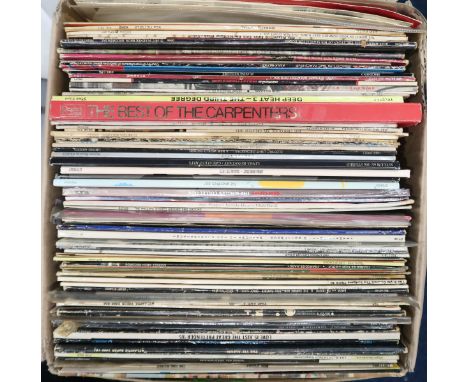 VINYL RECORDS a mixed box of mostly rock and R&amp;B vinyl LP records, to include such artists as The Beatles, Prince, The Po
