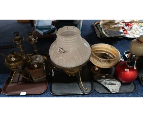 A hanging brass oil lamp, a spirit kettle, a pair of candlestands, a fossil, a soda syphon and other items Condition Report:N