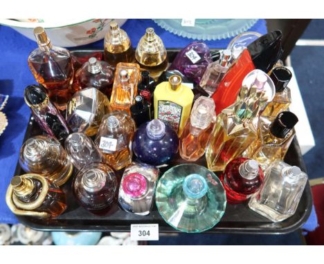 A collection of ladies perfumes some testers including Paco Rabanne, JeanPaul Gaultier, Estee Lauder, Britany Spears, Michael