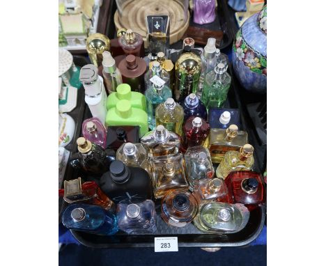 A collection of perfumes and aftershaves, some testers including Davidoff Cool Water, Giorgio Armani, Jimmy Choo, Lacoste, YS