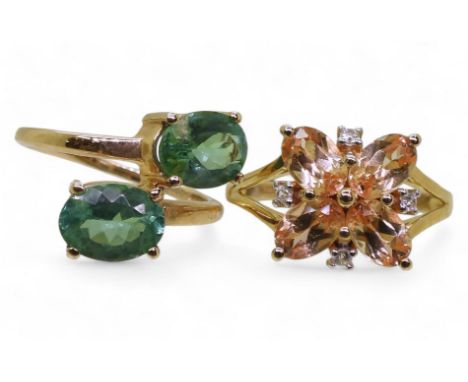 A 9ct imperial garnet and white zircon ring, size L1/2, still with Gemporia tag, together with a 9ct green apatite twin stone