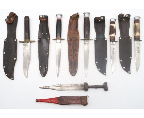 A collection of hunting-style knifes, to include to include two "I Cut My Way" examples by William Rodgers, Sheffield; Milbro