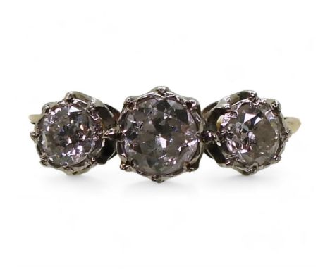 An 18ct gold three stone diamond ring, set with estimated approx 0.50cts of old cut diamonds, finger size K, weight 2.5gms Co