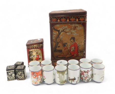 Two Japanese tea tins, Chinese spice boxes, a set of twelve Japanese cups, decorated with flowers and bamboo, and a Chinese i