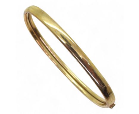 A 9ct gold bangle, inner dimensions 6cm x 4.5cm, weight 5.1gms Condition Report:Available upon request