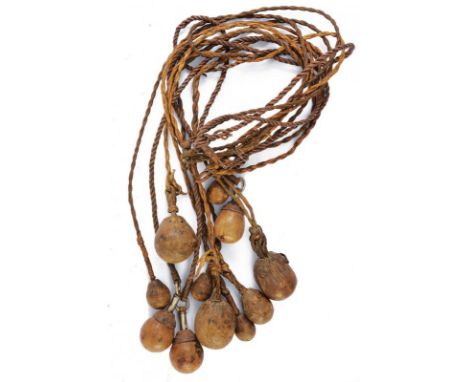 dating: 19th/20th Century provenance: South America, Leather, braided cords, leather-covered balls are tied to their ends (a 