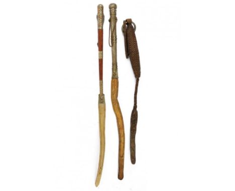 dating: 19th Century provenance: South America, Two with silver mounts, one completely in braided leather with iron ring. len