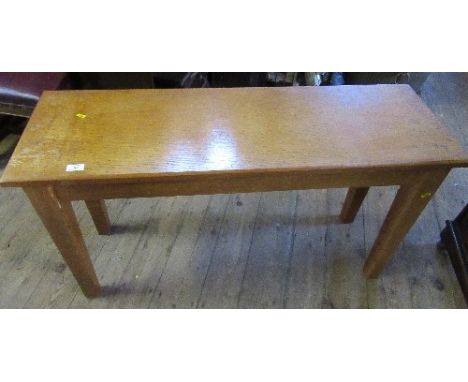 An oak rectangular bench or sidetable, 45ins x 15ins, height 25ins, together with a pine table, 30ins x 14ins, height 19ins