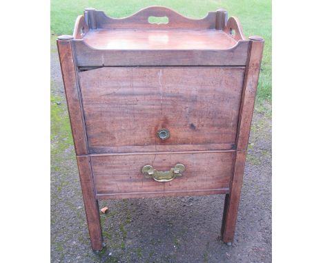 A 19th century mahogany pot cupboard, with tray top, over a hinged flap, to a pull out commode, 21.5ins x 18.5ins, height 31i