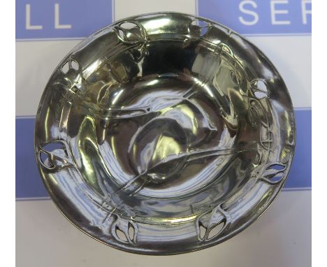 An English Pewter circular dish, designed by Archibald Knox, numbered 0546, diameter 5insCondition Report:  Some very light s