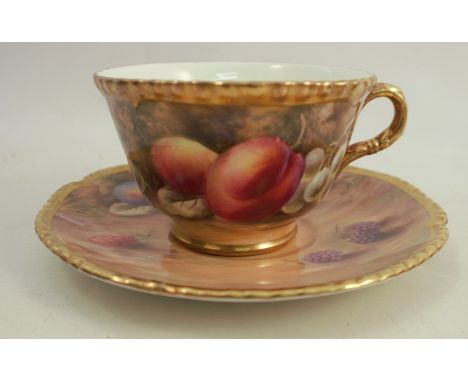 A Royal Worcester cup and saucer, decorated with fruit to a mossy background by P Love, dated 1953Condition Report:  Good con