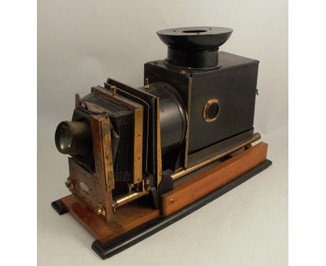Ross London, a&nbsp;19th century&nbsp;magic lantern, number 795, with lacquer and brass finish, with mahogany and ebonised ba