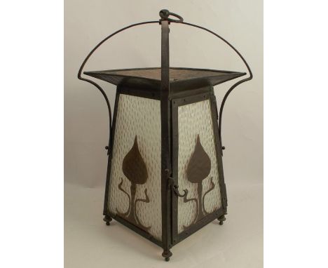 An Arts and Crafts style wrought iron hanging light shade, height 20ins