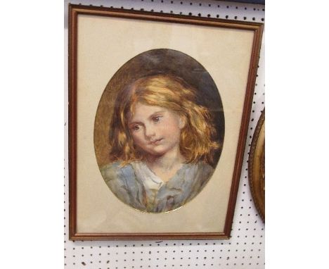 Watercolour, oval portrait of a young girl, head inclined to one side wearing blue smock top, 14 x 11.75ins