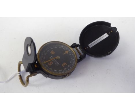 A World War II period W &amp; LE Gurley Troy military compass with a black dial (Please Note: this lot is subject to the stat