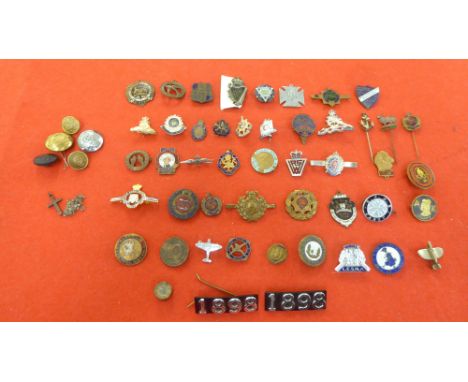 Miscellaneous vintage and later uniform and lapel badges; button and other insignia&nbsp; some copies &nbsp;(Please Note: thi