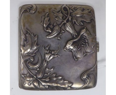 An Art Nouveau silver coloured metal folding cigarette case, on a button clasp, decorated with cast and chased floral and fol