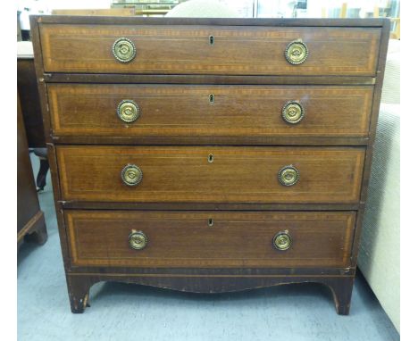 A Regency satinwood inlaid mahogany dressing chest with four graduated long drawers, raised on bracket feet&nbsp; 33"h&nbsp; 