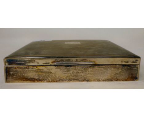 A silver cigarette box with a flush fitting hinge to the engine turned lid, enclosing a cedar lined interior&nbsp; H.Bros.&nb