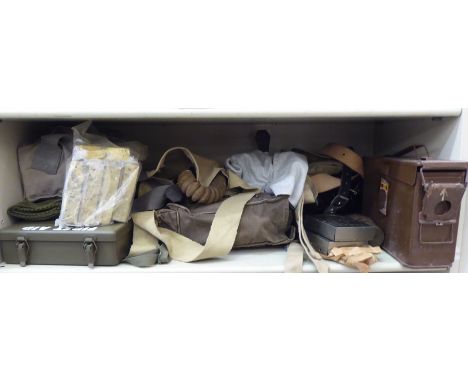 Military related items: to include a first aid box; an ammunition carrier and a gas mask holder&nbsp; (Please Note: this lot 