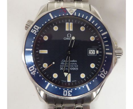 An Omega Seamaster 300m 'Fried Egg' blue titanium and stainless steel cased bracelet wristwatch, faced by a baton dial, incor