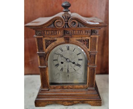 Early 20th century German walnut architectural mantle clock with silvered Roman face. 37cm high approx. (B.P. 21% + VAT)&nbsp