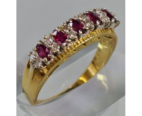 18ct gold seventeen stone diamond and ruby ring. 4.5g approx. Size O1/2. (B.P. 21% + VAT)