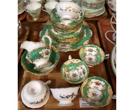 Early 20th century twenty two piece Mintons tea service with panels of floral sprays. (B.P. 21% + VAT)&nbsp;&nbsp;NO IN-HOUSE