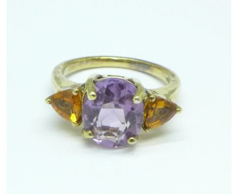 A silver gilt, amethyst and citrine ring, O