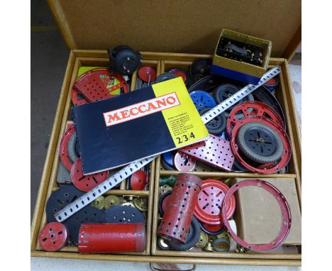 A large collection of Meccano in a wooden two layer box, with E020 and E20R electric motors, both boxed, and a book of models
