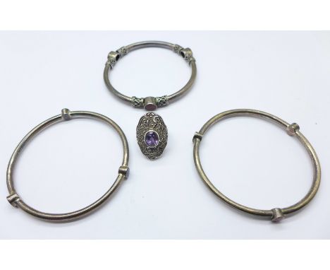 Three 925 silver bangles and a silver ring, 48g