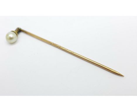 A pearl stick pin, with box