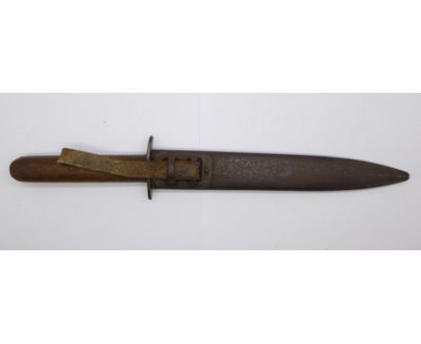 A WWI trench knife and scabbard