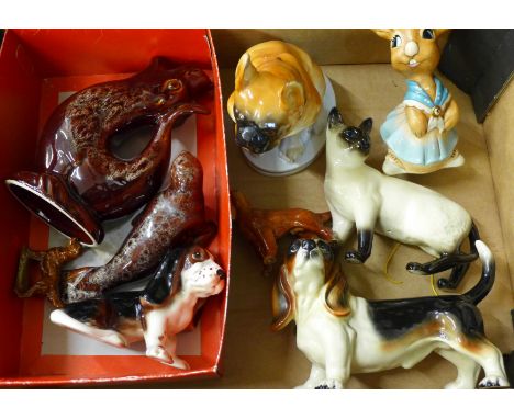 A Kernewek pottery seal jug and a model seal, a Pendelfin rabbit, a Beswick red setter, four other dog figures and a Siamese 