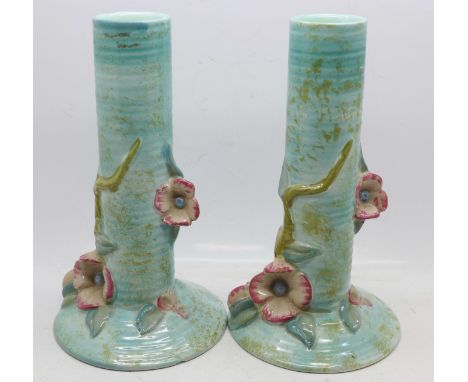 A pair of Clarice Cliff vases, one a/f, (small chip to base), 18.5cm