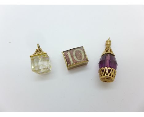 Two 9ct gold charms and a lantern charm