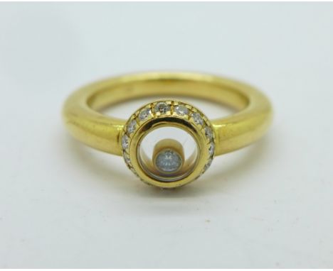 An 18ct gold and diamond Chopard ring, 7.2g, L