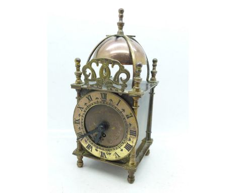 A Smiths brass lantern clock