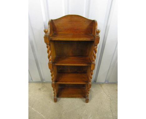 A vintage turned oak four shelf bookcase, 42 x 21 x 100 cm