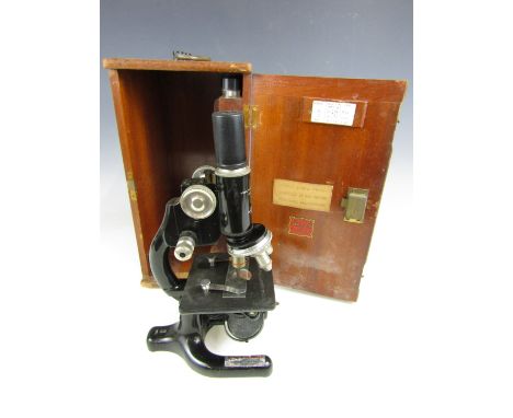 A vintage Hawkesley and Sons of London microscope in a fitted wooden case 
