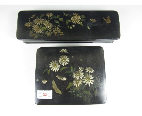 A matching Victorian japanned glove and trinket box set, each hand enamelled with daisies 