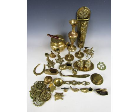 A large quantity of vintage brass ware including a kettle, a vase and horse brasses etc.